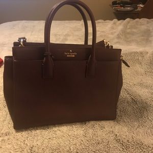 Burgundy Kate Spade large hand bag.
